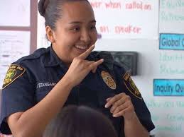 Texas police officer use sign language